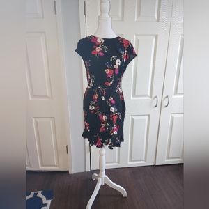 Pop Sugar brand women's size small dress. Black with floral pattern.